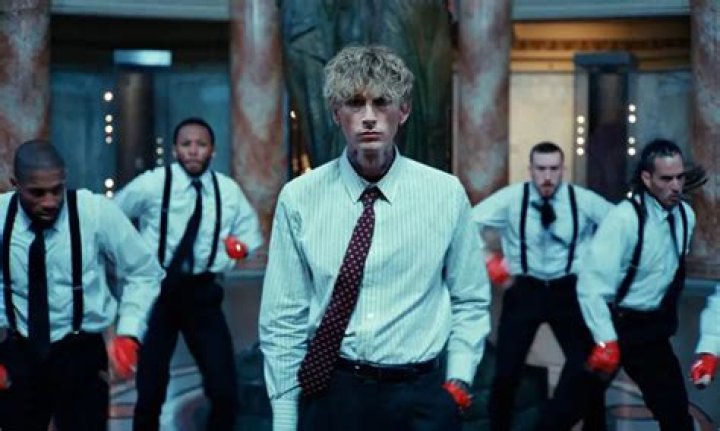 Who writes MGK songs?