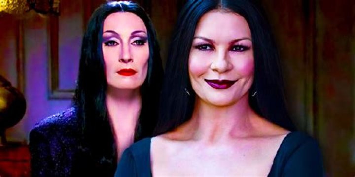 Why does Morticia have a light on her face?
